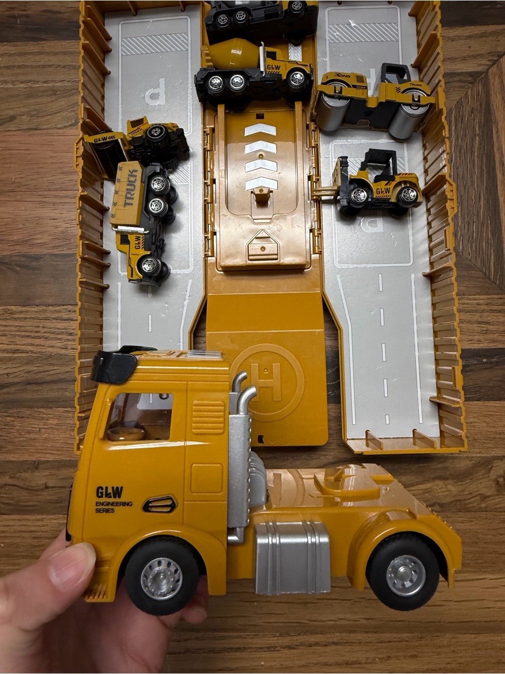 Toy Semi Truck and Trailer filled with 6 Construction Trucks